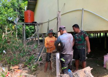 Sumur Bor TMMD Ke-129 Kodim 1206/Putussibau di Gedung Serbaguna Tauk Begulai Dusun Belatung Akhirnya Keluarkan Air